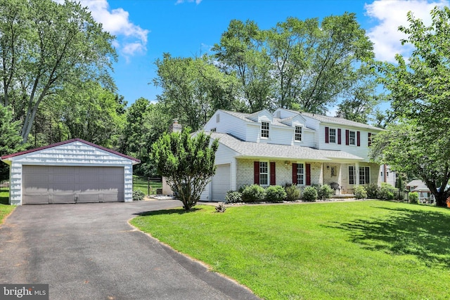 441 Barker Dr, West Chester, PA 19380 - view of front of home with a front lawn, a garage, brick siding, and roof with shingles
