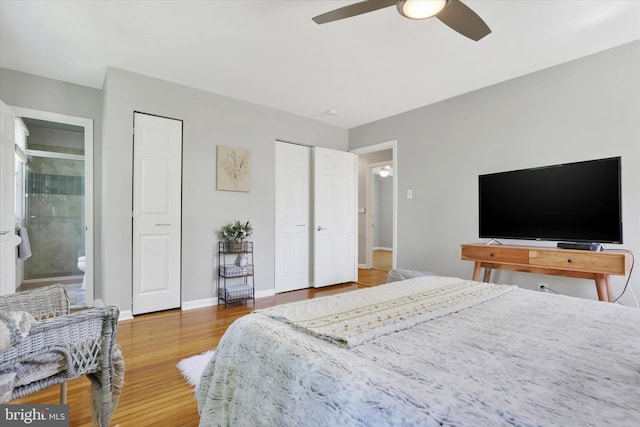 441 Barker Dr, West Chester, PA 19380 - bedroom with wood finished floors, connected bathroom, two closets, and a ceiling fan