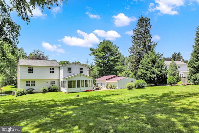 441 Barker Dr, West Chester, PA 19380 - rear view of house with a sunroom and a chimney