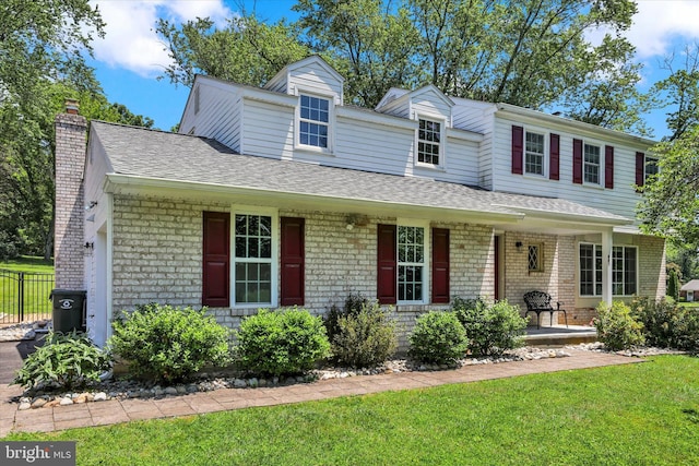 441 Barker Dr, West Chester, PA 19380 - view of front facade featuring brick siding, roof with shingles, a porch, and a chimney