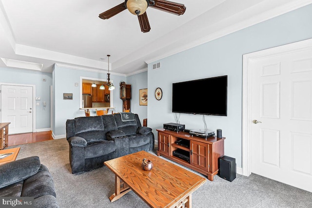 7000 Village Way Unit 408, Boothwyn, PA 19061 - living area with carpet flooring, a raised ceiling, and ceiling fan