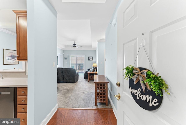 7000 Village Way Unit 408, Boothwyn, PA 19061 - hallway with ornamental molding and wood finished floors