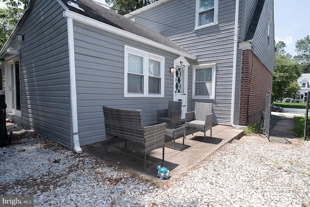 10 Holbrook Rd, Havertown, PA 19083 - view of side of property with roof with shingles and brick siding