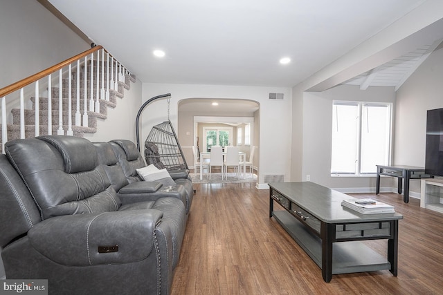 10 Holbrook Rd, Havertown, PA 19083 - living room featuring arched walkways, stairs, wood finished floors, recessed lighting, and beam ceiling