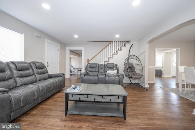 10 Holbrook Rd, Havertown, PA 19083 - living room with arched walkways, recessed lighting, stairs, and wood finished floors