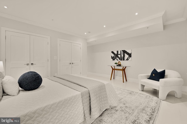 26 Rhode Island Ave NW Unit 1, Washington, DC 20001 - tiled bedroom featuring ornamental molding, two closets, and recessed lighting