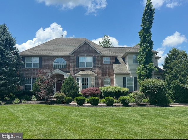 208 Hickory Ln, Mullica Hill, NJ 08062 - view of front of house featuring a front lawn and brick siding