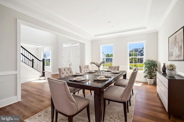 3904 Diplomat Ave, Bowie, MD 20721 - dining area with a tray ceiling, plenty of natural light, wood finished floors, and stairs