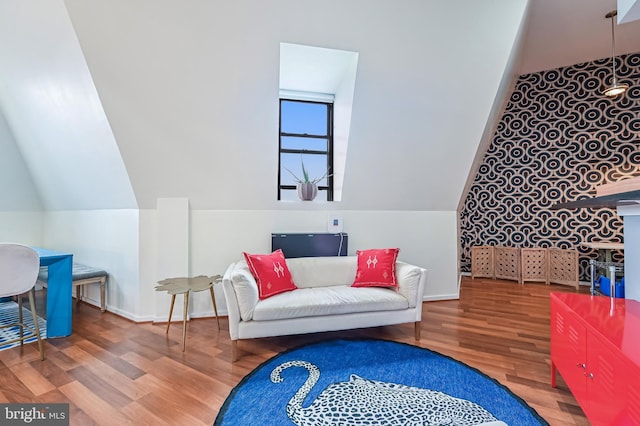 1211 Light St Unit 412, Baltimore, MD 21230 - living area with wood finished floors and lofted ceiling