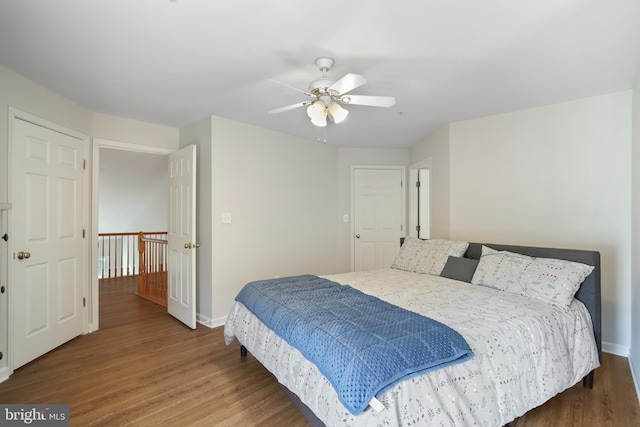 12941 Bridger Dr Unit 1611, Germantown, MD 20874 - bedroom with wood finished floors and a ceiling fan