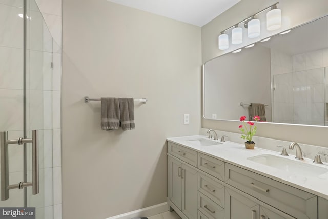 12941 Bridger Dr Unit 1611, Germantown, MD 20874 - bathroom with double vanity and a tile shower