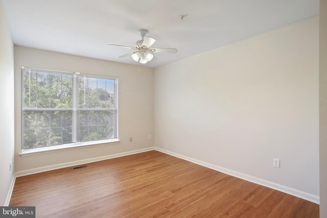 12941 Bridger Dr Unit 1611, Germantown, MD 20874 - spare room featuring light wood-style floors and a ceiling fan