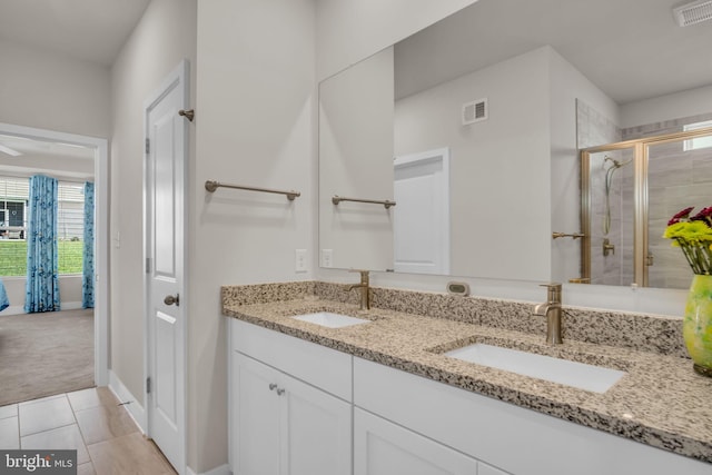 43 Boneset Dr, Gettysburg, PA 17325 - full bath with double vanity, a shower stall, and tile patterned flooring
