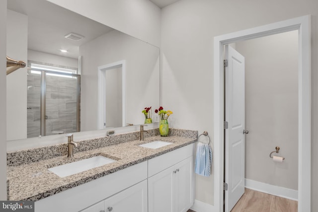 43 Boneset Dr, Gettysburg, PA 17325 - full bathroom featuring double vanity and a stall shower