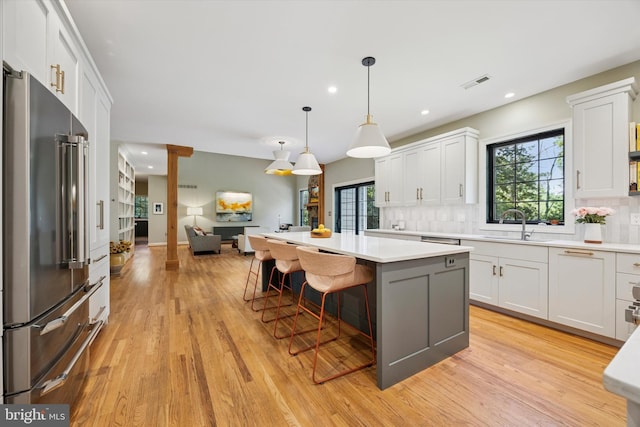 150 Waterview Dr, Glenmoore, PA 19343 - kitchen featuring high end refrigerator, tasteful backsplash, light countertops, and recessed lighting