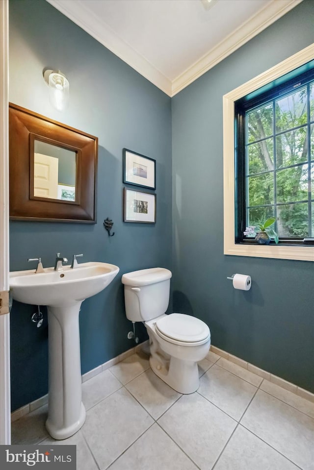 150 Waterview Dr, Glenmoore, PA 19343 - half bathroom featuring ornamental molding and tile patterned flooring