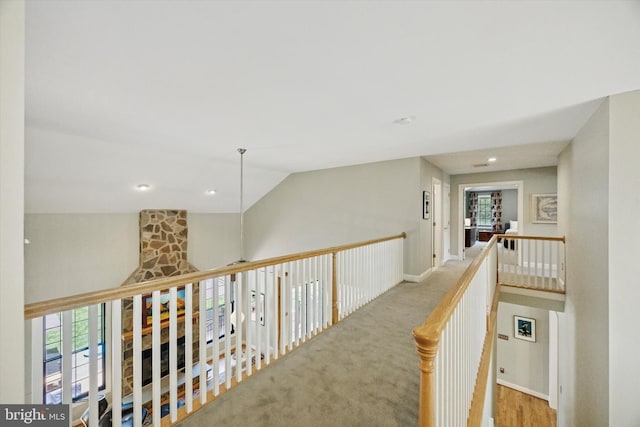 150 Waterview Dr, Glenmoore, PA 19343 - hallway featuring healthy amount of natural light, an upstairs landing, vaulted ceiling, and recessed lighting