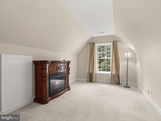 6720 Walter Scott Way, Columbia, MD 21044 - bonus room featuring light carpet, a glass covered fireplace, and vaulted ceiling