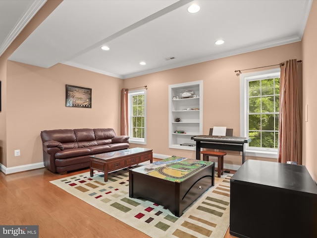 6720 Walter Scott Way, Columbia, MD 21044 - living area featuring wood finished floors, plenty of natural light, ornamental molding, and recessed lighting
