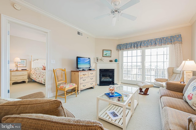 301 14th St Unit 304, Ocean City, MD 21842 - carpeted living area featuring ornamental molding, ceiling fan, and a glass covered fireplace