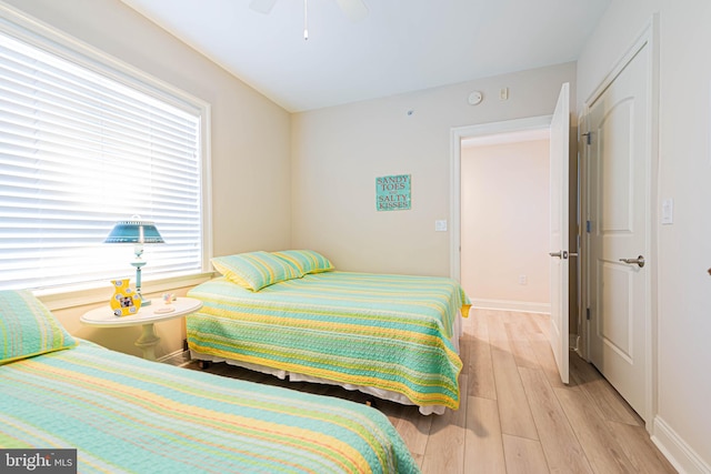 301 14th St Unit 304, Ocean City, MD 21842 - bedroom featuring light wood-style flooring and ceiling fan
