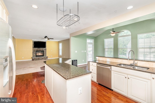 10535 Windlass Run Rd, Baltimore, MD 21220 - kitchen featuring refrigerator with ice dispenser, ceiling fan, stainless steel dishwasher, open floor plan, and recessed lighting