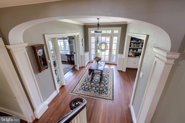 152 Main St, New Providence, PA 17560 - foyer entrance featuring arched walkways, wood finished floors, and crown molding