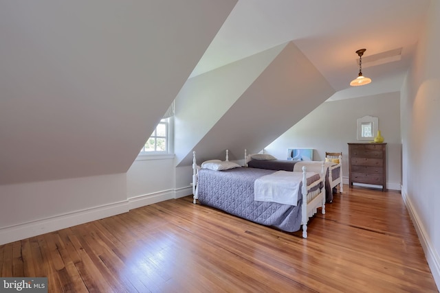 152 Main St, New Providence, PA 17560 - bedroom with hardwood / wood-style floors and vaulted ceiling
