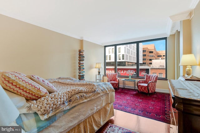 1155 23rd St NW Unit 5L, Washington, DC 20037 - bedroom with wood finished floors and ornamental molding