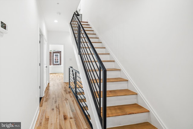 3084 Weikel St, Philadelphia, PA 19134 - stairway with wood finished floors and recessed lighting