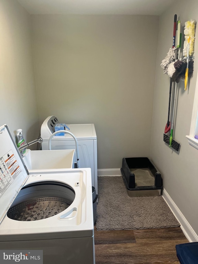 499 Prospect Rd, Warminster, PA 18974 - laundry room with separate washer and dryer and dark wood-type flooring