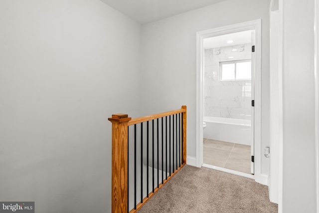233 S Clinton St, Baltimore, MD 21224 - corridor featuring an upstairs landing and carpet