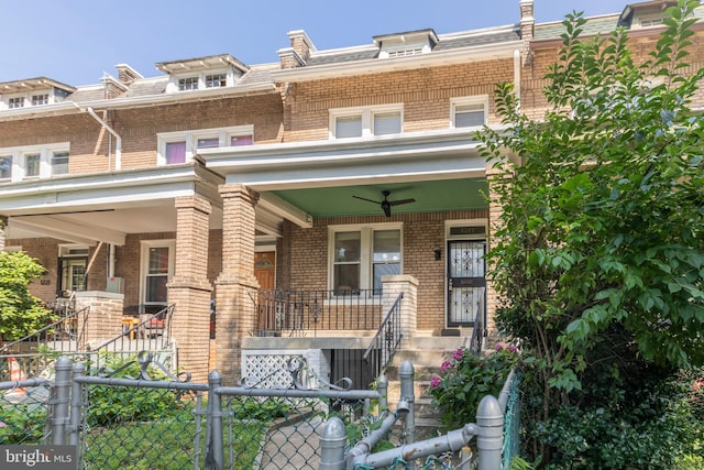 1217 Holbrook St NE, Washington, DC 20002 - multi unit property with covered porch, brick siding, ceiling fan, and mansard roof