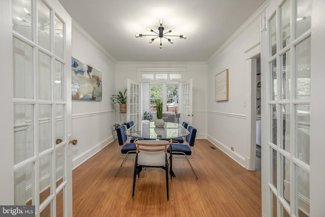 1217 Holbrook St NE, Washington, DC 20002 - dining room featuring french doors, ornamental molding, and wood finished floors