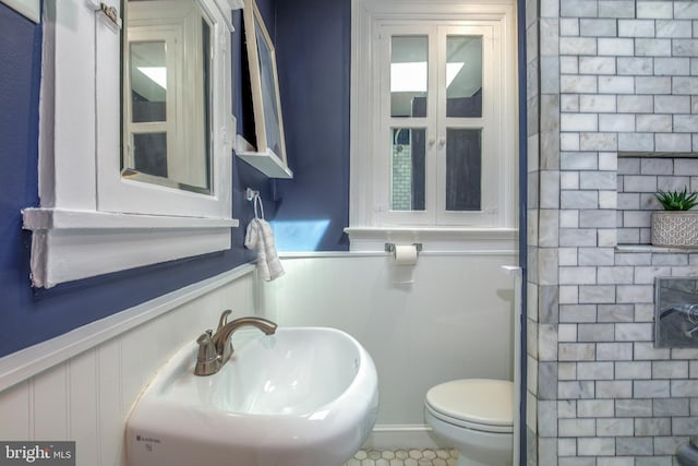 1217 Holbrook St NE, Washington, DC 20002 - bathroom featuring a decorative wall and a wainscoted wall