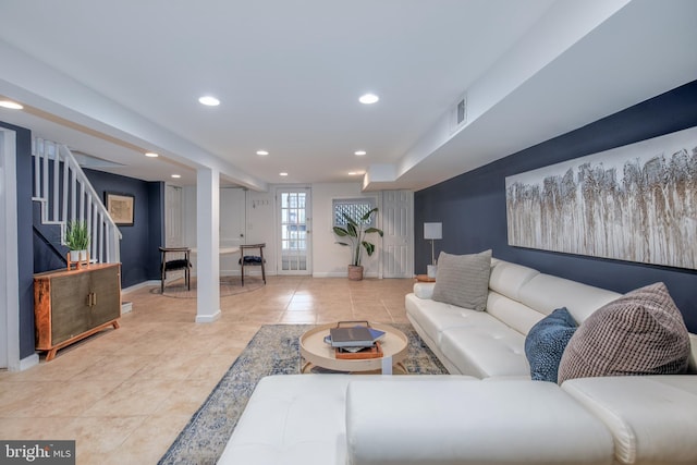1217 Holbrook St NE, Washington, DC 20002 - living area featuring light tile patterned flooring, stairs, and recessed lighting