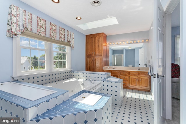 421 Dart Dr, Hanover, PA 17331 - full bathroom with a skylight, a whirlpool tub, vanity, recessed lighting, and a shower