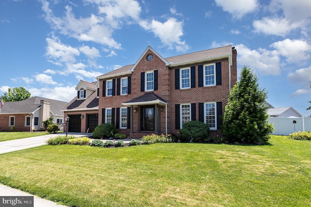421 Dart Dr, Hanover, PA 17331 - view of front facade with brick siding, concrete driveway, a garage, and a shingled roof