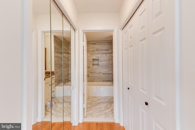 11710 Scooter Ln Unit 7, Fairfax, VA 22030 - corridor with light wood-type flooring