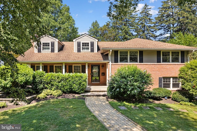 14 Birchall Dr, Haddonfield, NJ 08033 - tri-level home with a front lawn, brick siding, and roof with shingles