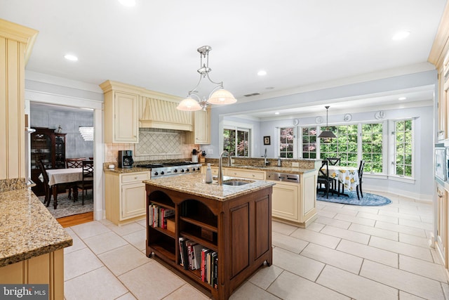 14 Birchall Dr, Haddonfield, NJ 08033 - kitchen featuring cream cabinetry, premium range hood, light tile patterned flooring, light stone counters, and recessed lighting