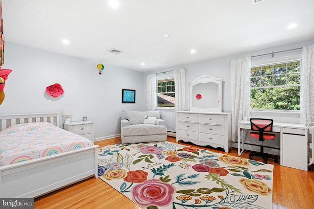 14 Birchall Dr, Haddonfield, NJ 08033 - bedroom with multiple windows, wood finished floors, a baseboard radiator, and recessed lighting
