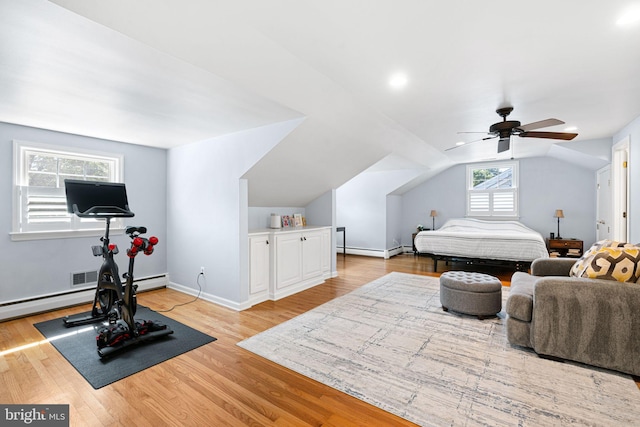 14 Birchall Dr, Haddonfield, NJ 08033 - bedroom featuring light wood-type flooring, vaulted ceiling, a baseboard heating unit, and ceiling fan