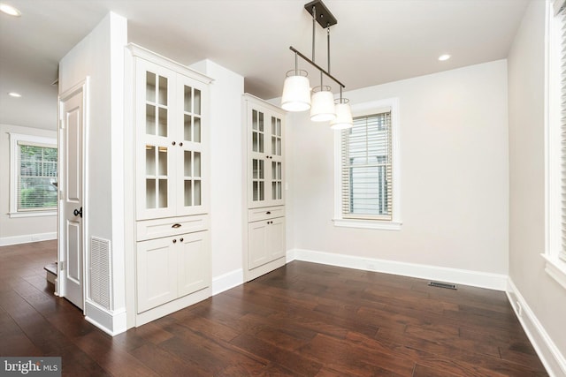 5 Madison St, Princeton, NJ 08542 - unfurnished dining area with dark wood-type flooring and recessed lighting