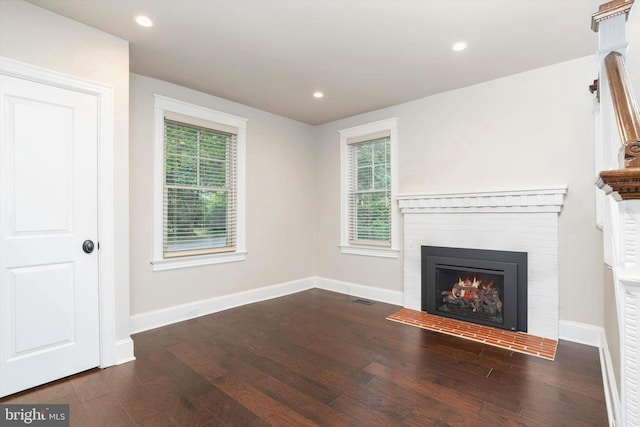 5 Madison St, Princeton, NJ 08542 - unfurnished living room with wood finished floors, a brick fireplace, healthy amount of natural light, and recessed lighting