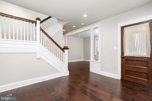 5 Madison St, Princeton, NJ 08542 - foyer entrance with ornate columns, wood-type flooring, stairway, and recessed lighting