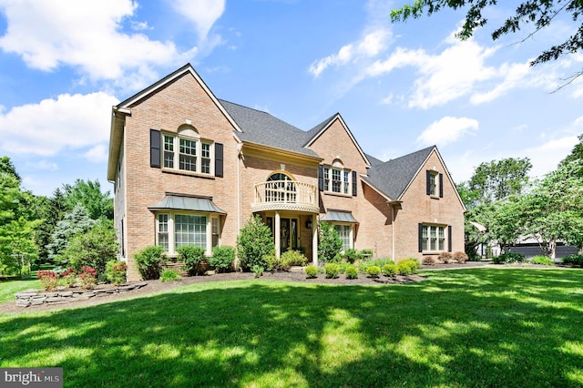 75 Bittersweet Dr, Doylestown, PA 18901 - georgian-style home featuring brick siding, a front lawn, and a balcony