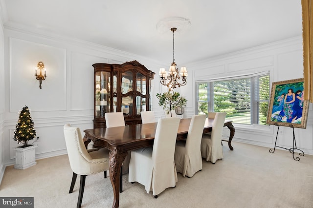75 Bittersweet Dr, Doylestown, PA 18901 - dining space featuring a decorative wall, a chandelier, light carpet, and crown molding