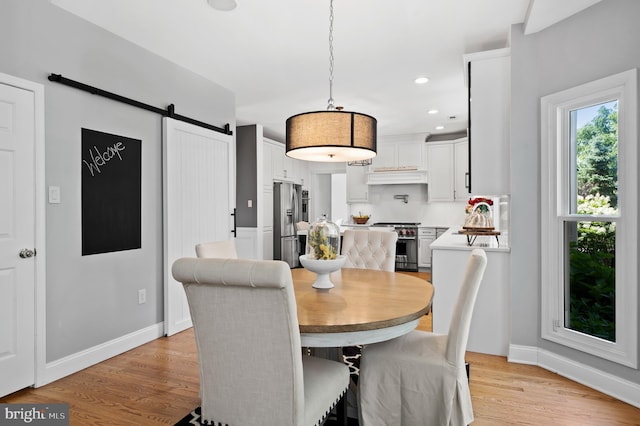 75 Bittersweet Dr, Doylestown, PA 18901 - dining area featuring light wood-type flooring, a barn door, and recessed lighting