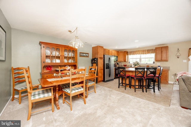 2751 Fynamore Ln, Downingtown, PA 19335 - dining area featuring a chandelier and baseboards